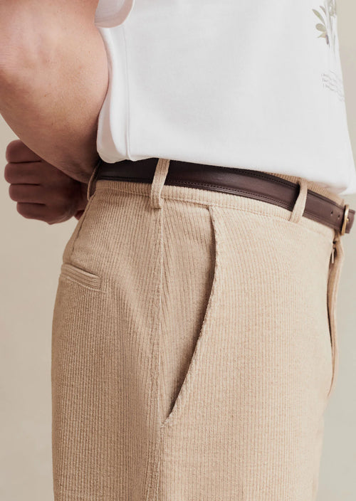 De Bonne Facture undyed cotton and linen balloon trousers with corduroy fabric, relaxed fit, and natural earthy tones.