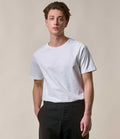 White Merz b Schwanen 215 Loopwheeled T-Shirt, casual clothing with a classic fit and smooth fabric, displayed on a hanger.