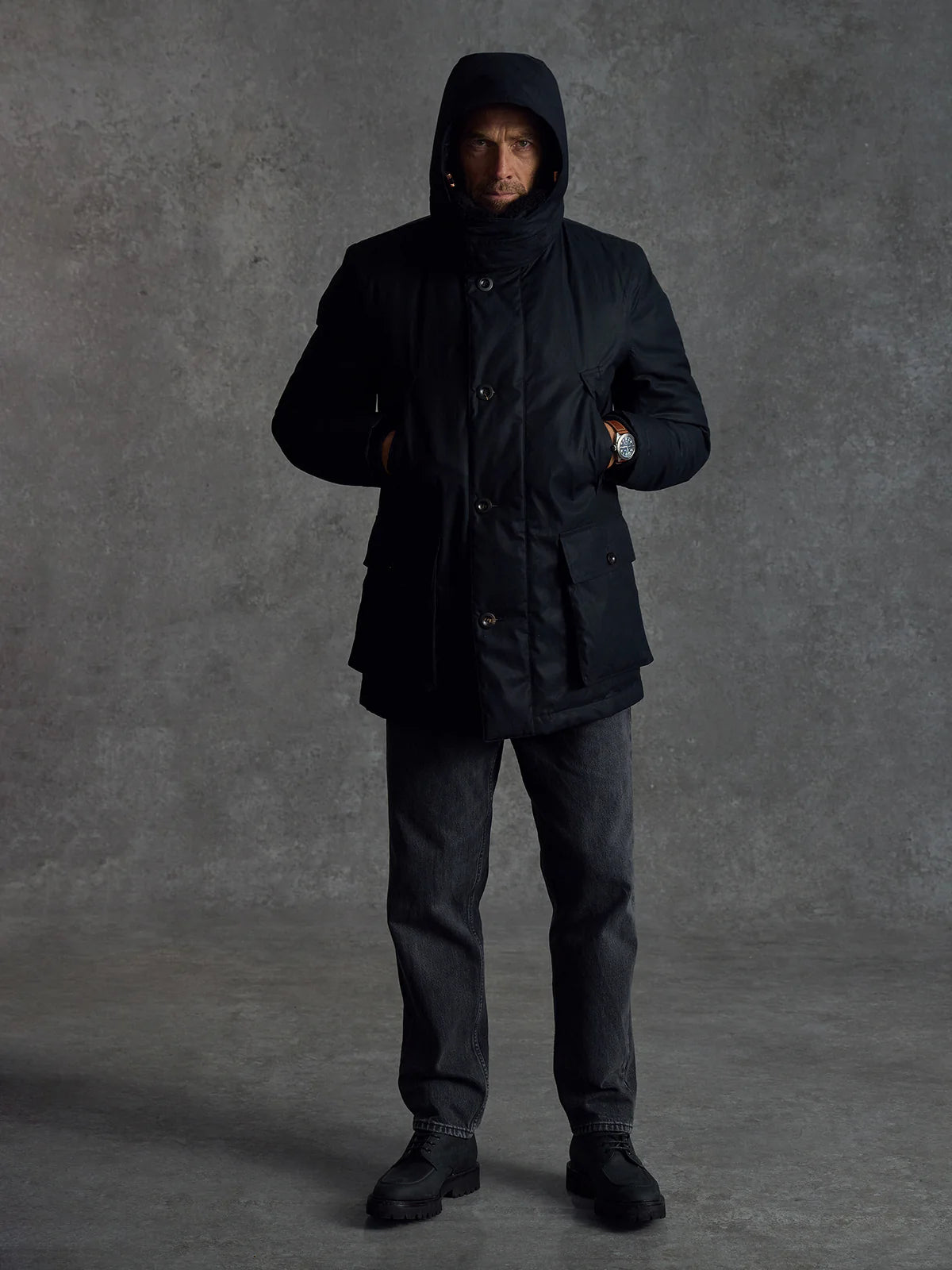 Black Shadow Parka by Private White V.C., a stylish men's black winter coat with a hood and durable fabric.