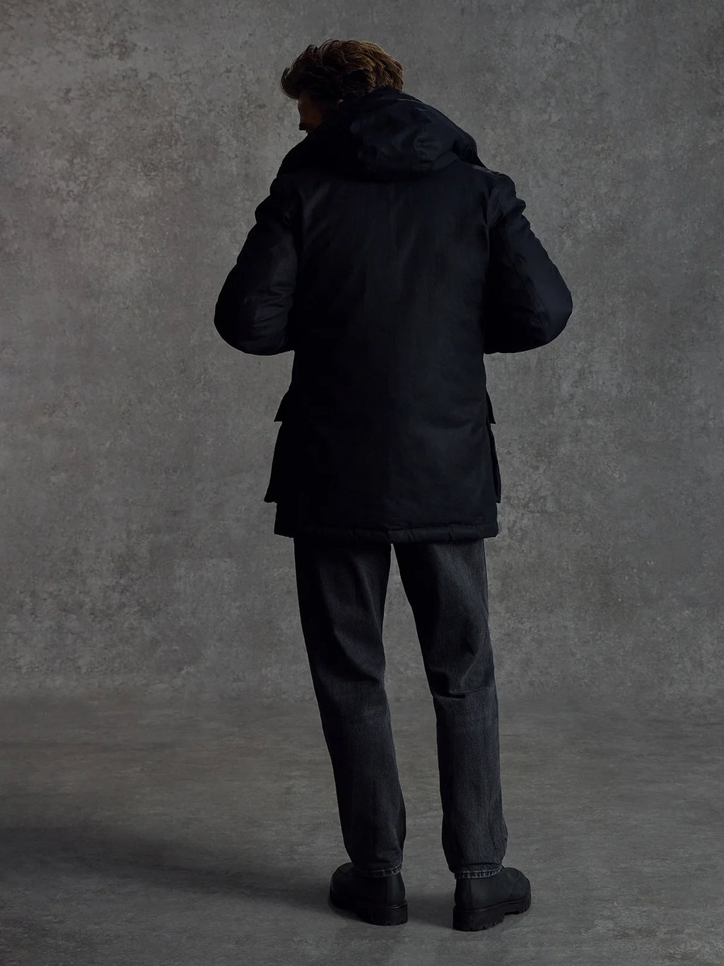 Black Shadow Parka by Private White V.C., stylish men's clothing with a modern hooded design and durable fabric.