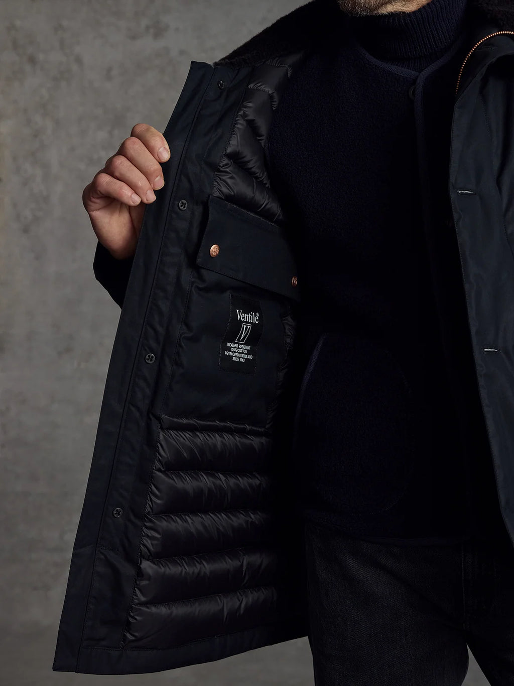 Black Shadow Parka by Private White V.C., a stylish men's clothing jacket with a sleek design and functional details.
