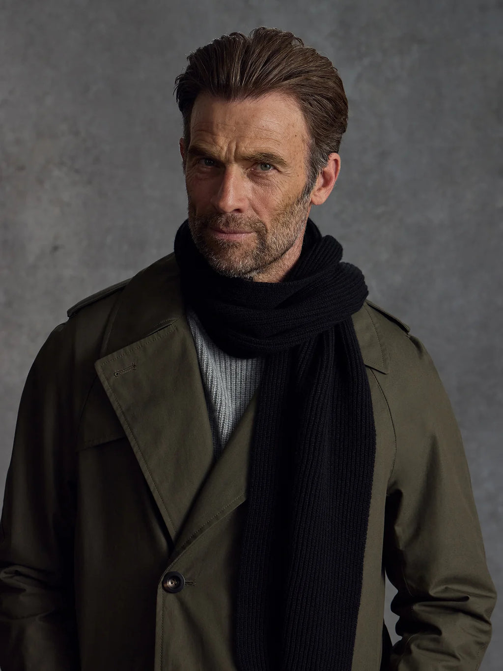 Black cashmere scarf from Private White V.C., featuring ribbed knit design, perfect for stylish winter clothing.