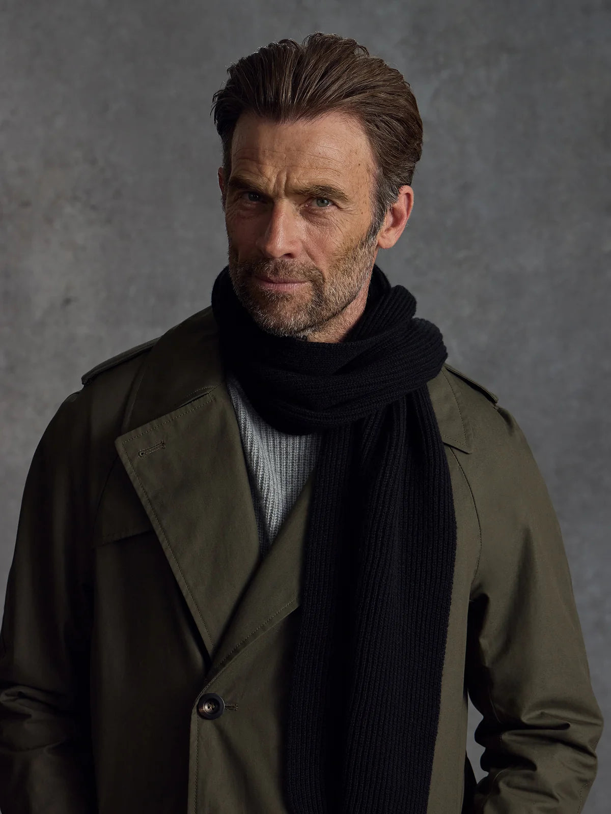 Black cashmere scarf from Private White V.C., featuring ribbed knit design, perfect for stylish winter clothing.