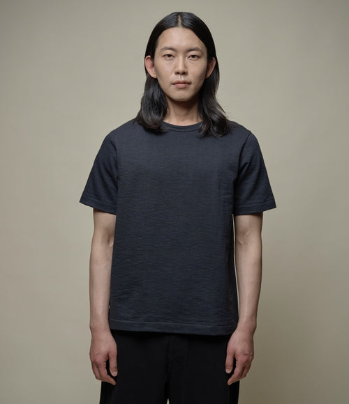 Heavy slub cotton T-shirt by Merz b Schwanen, light blue color, classic fit, with short sleeves and textured fabric.