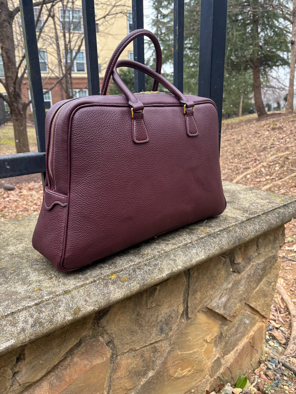 Bronson Leatherworks Bull-Calf Bag in Rouge Sellier leather, stylish and compact bag with leather strap and detailed stitching.