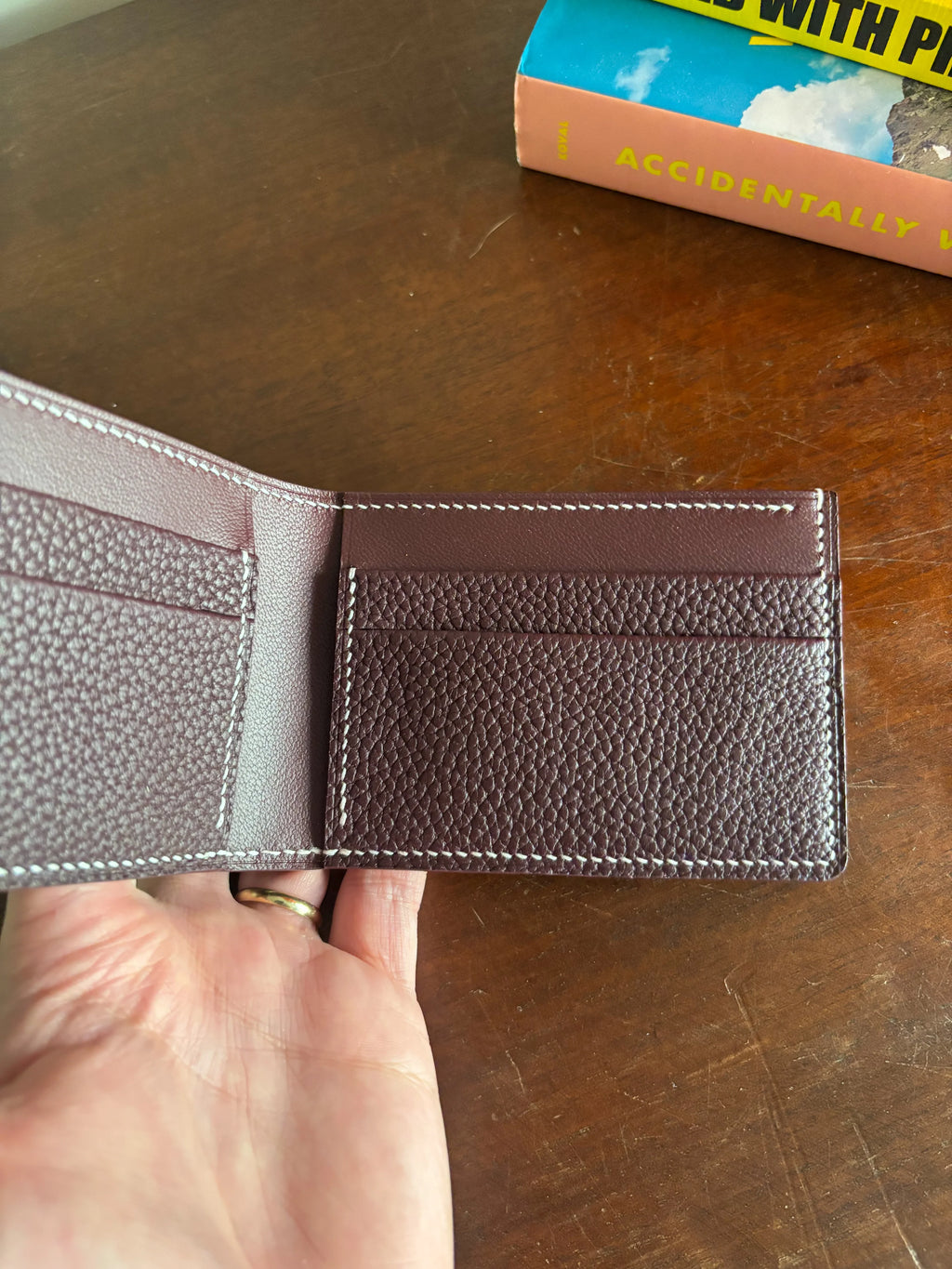 Bronson Leatherworks Bull-Calf Billfold in Rouge Sellier leather, showcasing a compact, elegant wallet with detailed stitching.
