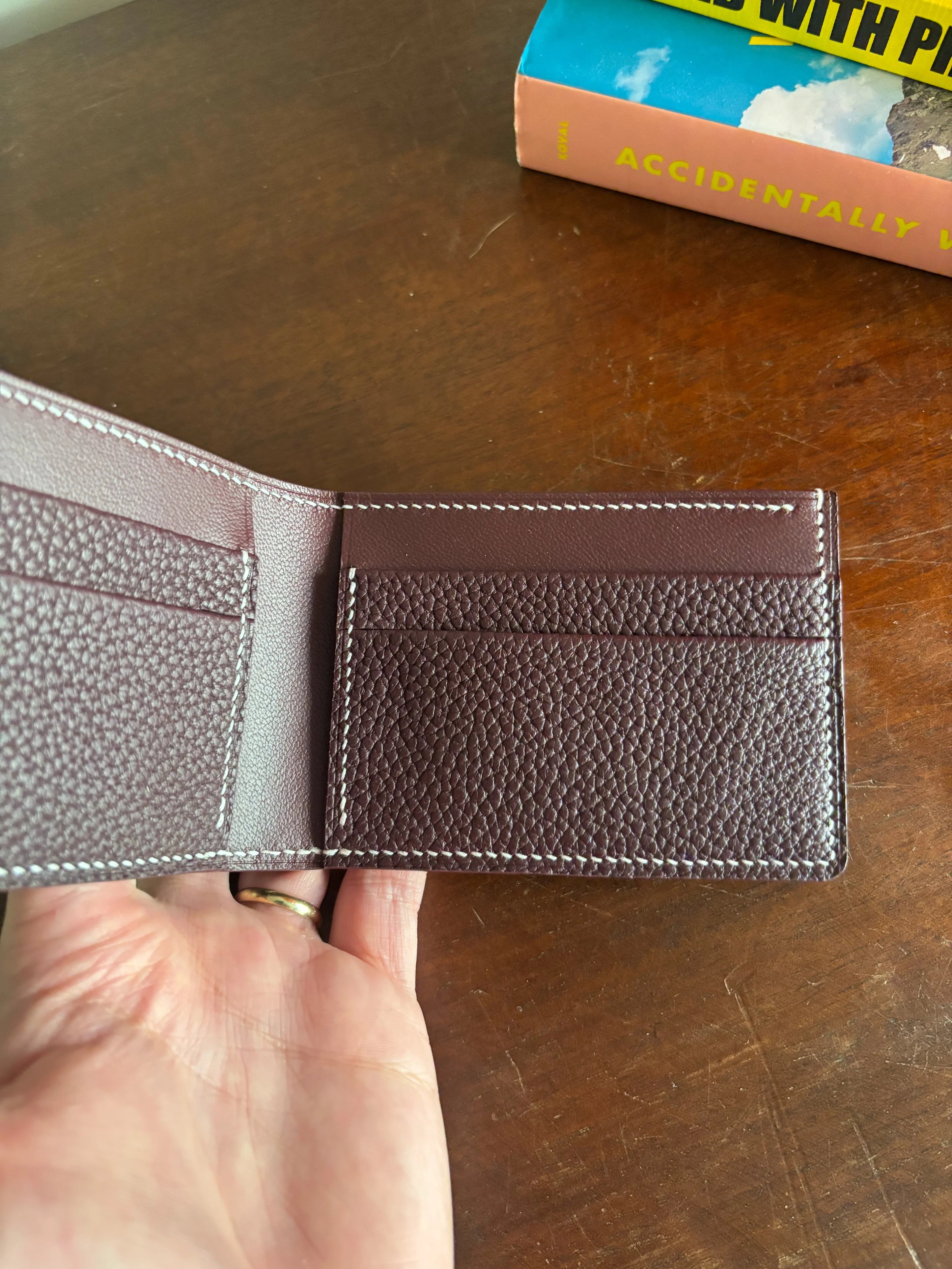 Bronson Leatherworks Bull-Calf Billfold in Rouge Sellier leather, showcasing a compact, elegant wallet with detailed stitching.