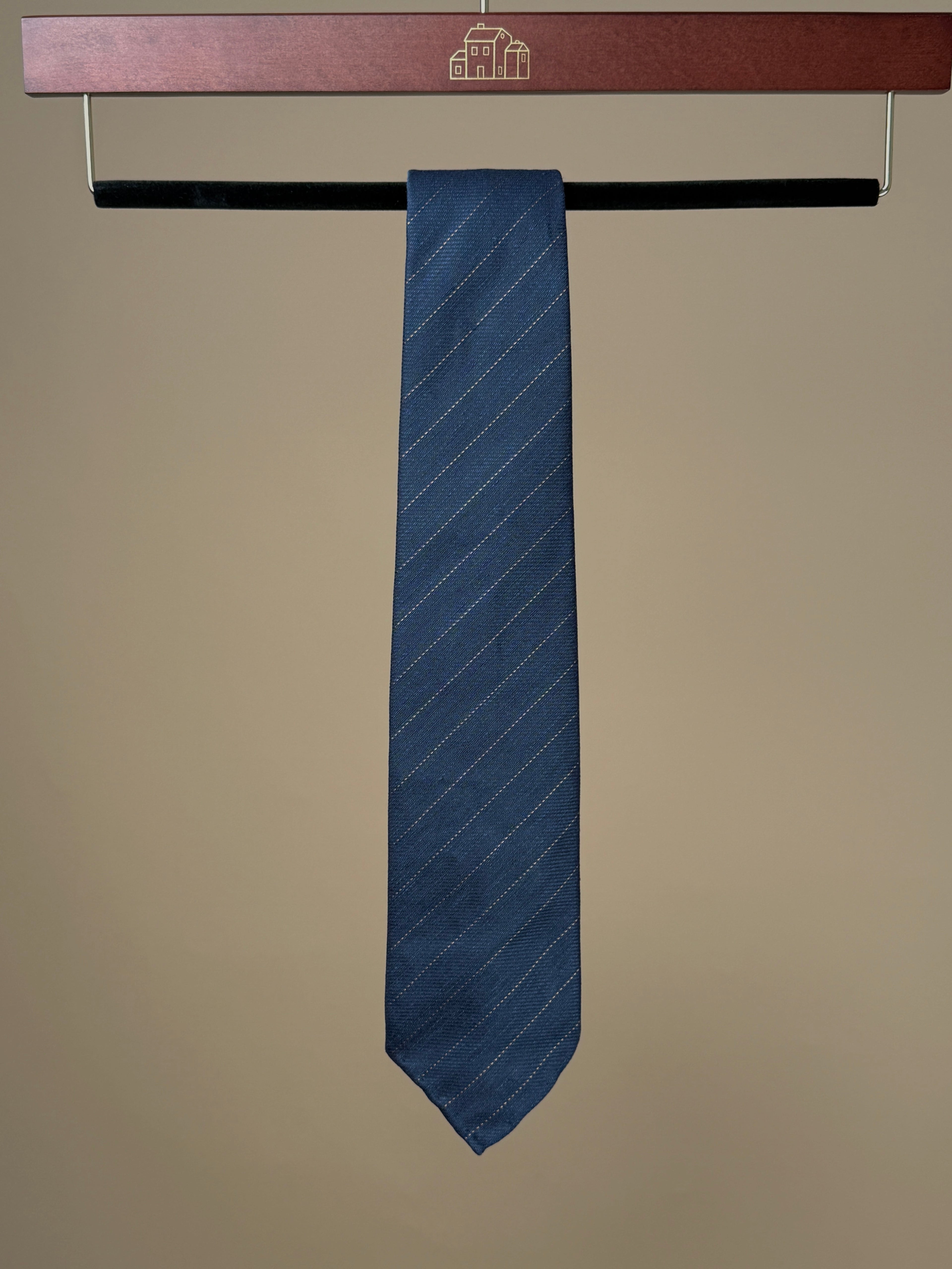 Navy pinstripe linen silk tie by Paolo Albizzati, showcasing a stylish accessory with a sleek, elegant design.