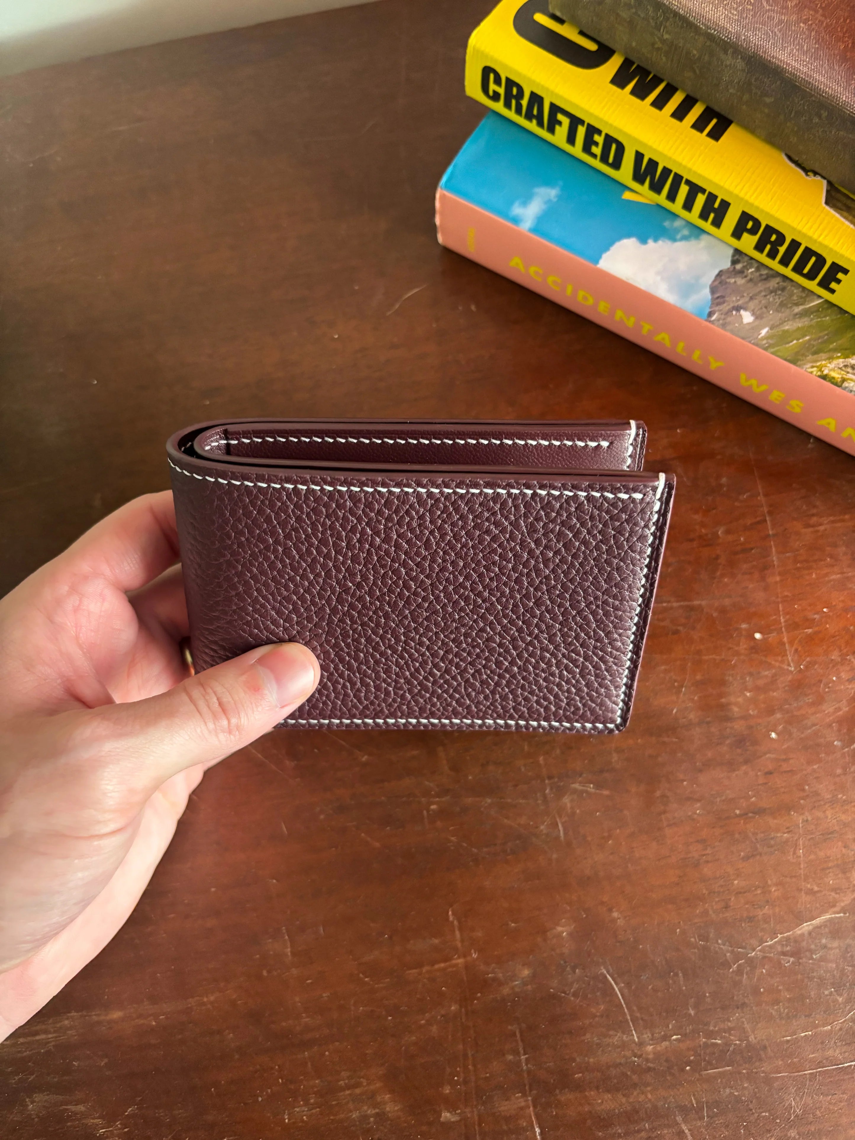 Bronson Leatherworks Bull-Calf Billfold in Rouge Sellier leather, featuring a compact, stylish wallet with multiple card slots.