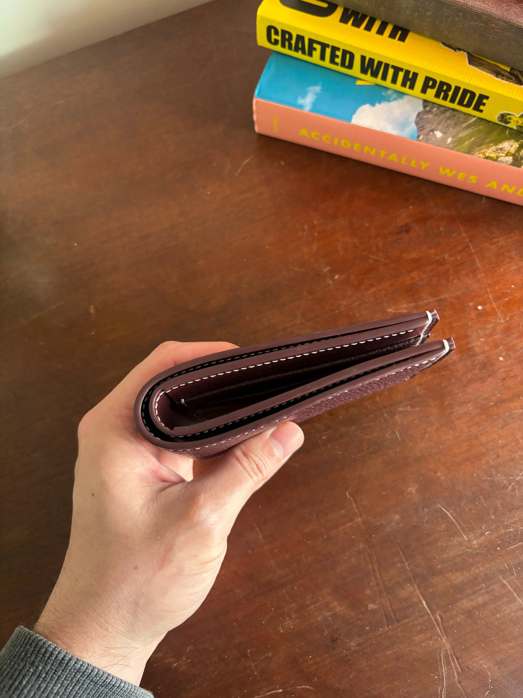 Bronson Leatherworks Bull-Calf Billfold in Rouge Sellier leather showing the compact, stylish wallet with multiple card slots.