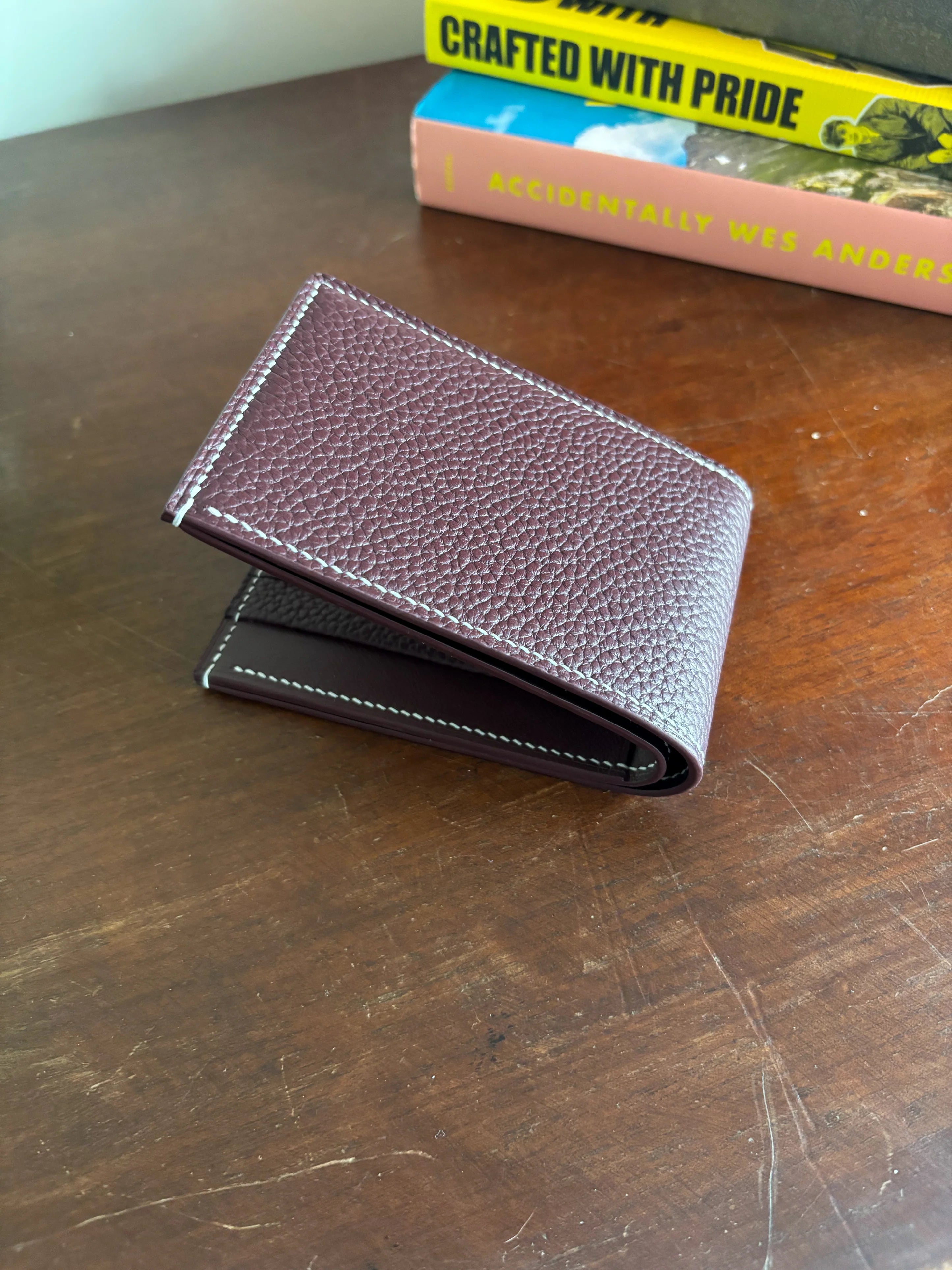 Bronson Leatherworks Bull-Calf Billfold in Rouge Sellier leather, showcasing a compact, stylish accessories wallet with card slots.