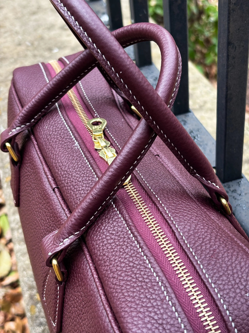 Bronson Leatherworks Bull-Calf Bag in Rouge Sellier leather, stylish and compact bag featuring natural leather texture and detailed stitching.