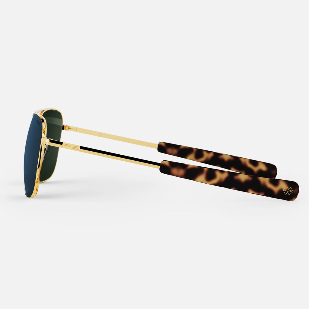 Randolph USA Aviator accessories in 23K gold and cobalt, featuring sleek, stylish design with polished metal finish.