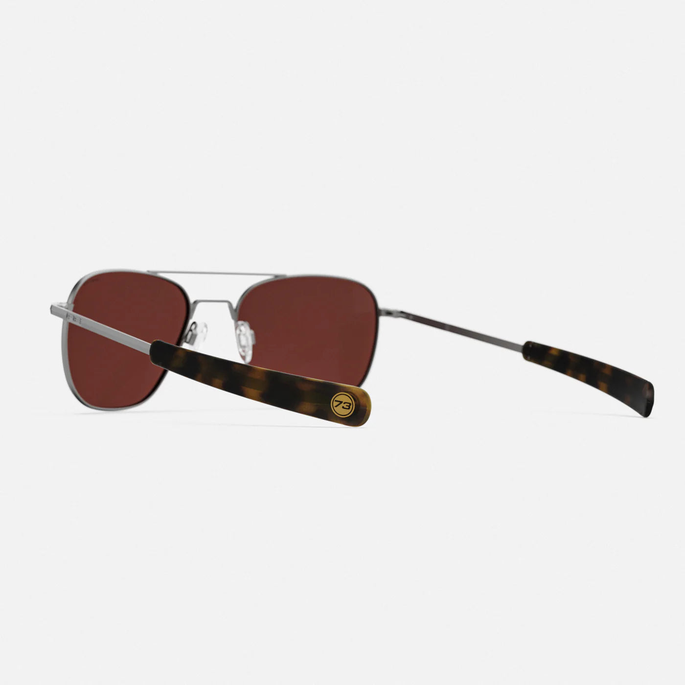 Randolph USA Aviator accessories with satin gunmetal finish and Le Mans blue accents, featuring sleek, modern design details.