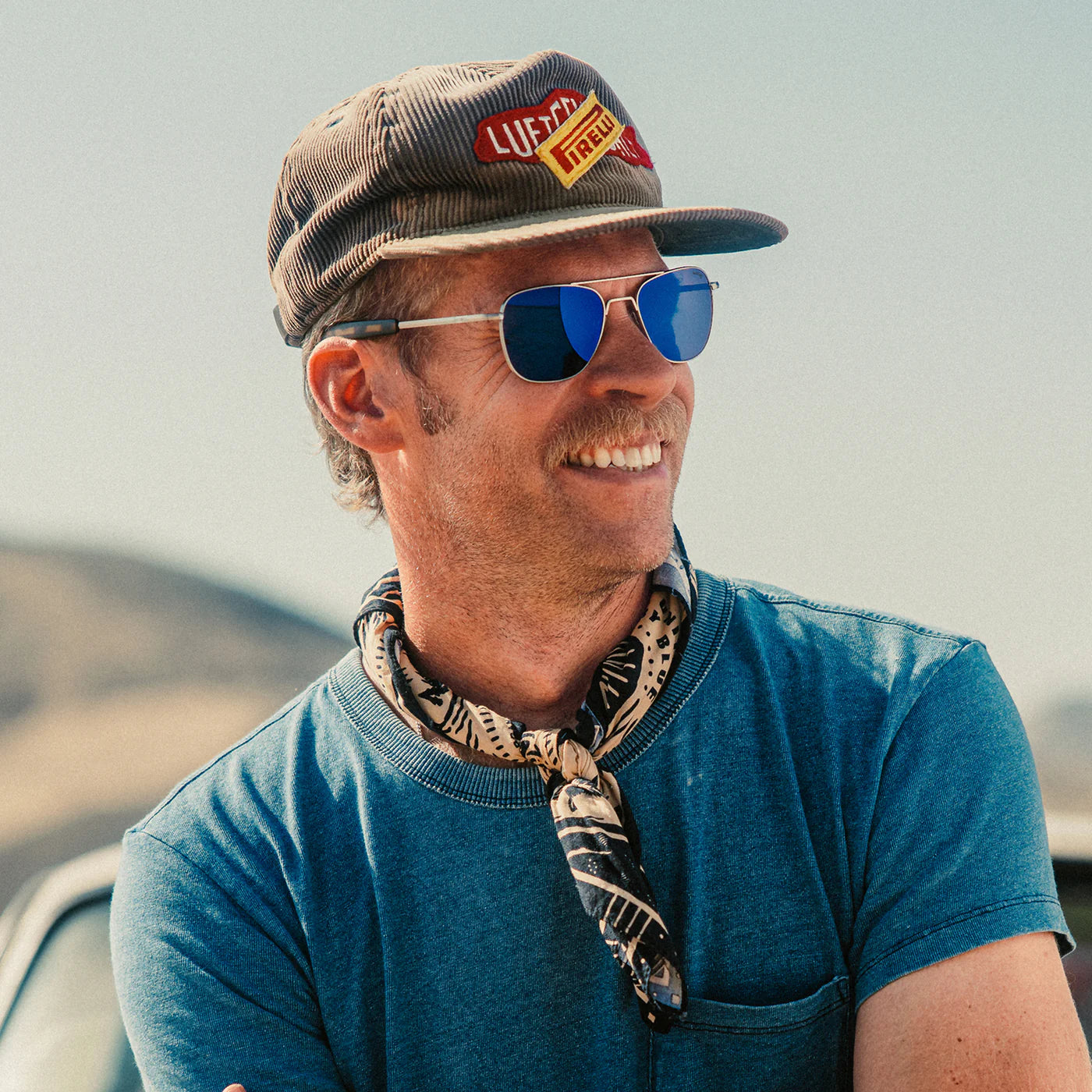 Randolph USA aviator accessories with satin gunmetal finish and Le Mans Blue accents, featuring detailed design and craftsmanship.