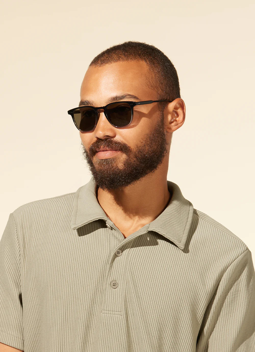 Garrett Leight Brooks sunglasses with butterscotch frames and green polarized lenses, stylish accessories with a modern design.