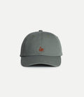 Light army cotton twill cap with Swan logo by Merz b Schwanen, featuring a classic baseball cap style and adjustable strap.