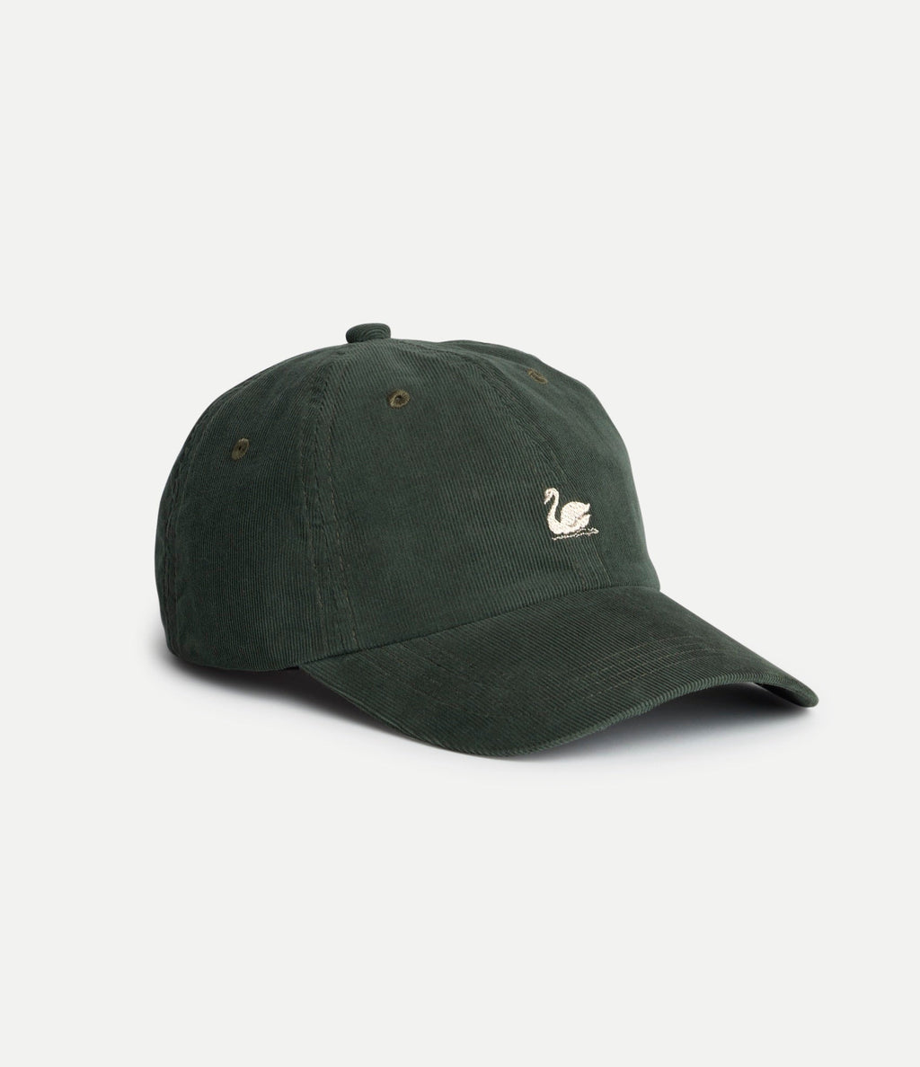 Forest green corduroy cap with Swan logo from Merz b Schwanen, stylish accessories with a classic design.