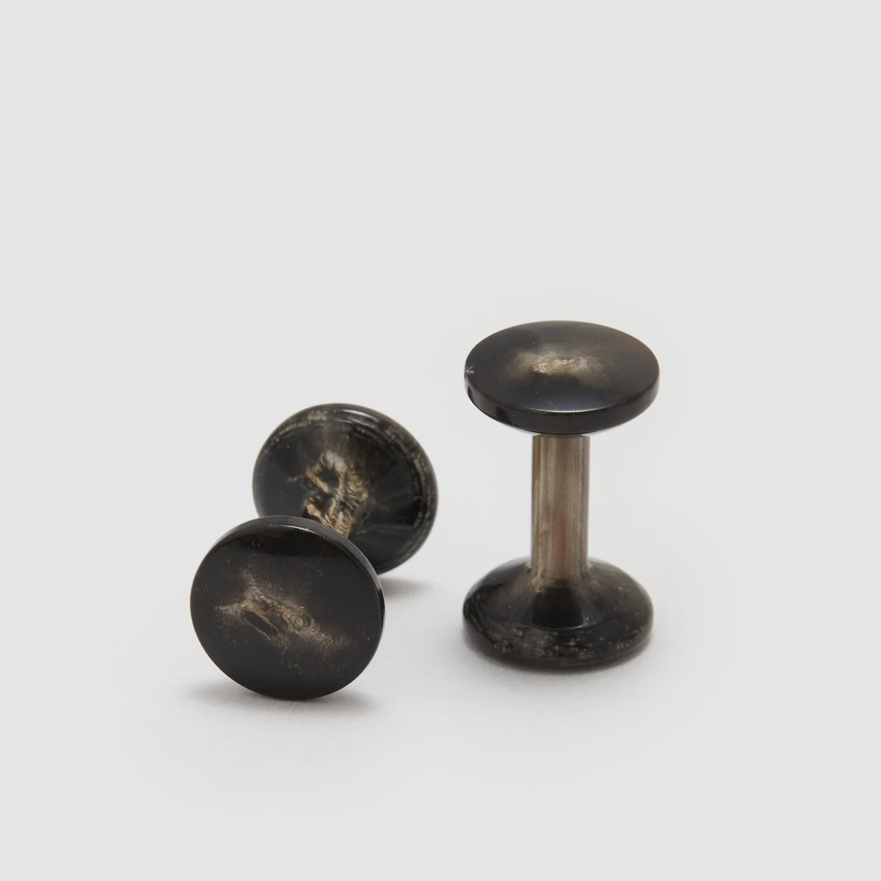 Horn Bow Cufflinks by Codis Maya, stylish accessories featuring polished horn design with bow-shaped accents.