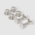 Rhodium bow stud earrings by Codis Maya, small brass accessories with polished finish, ideal for elegant dress accessories.