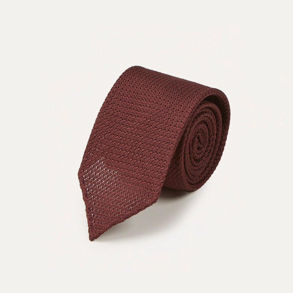 Large Knot Grenadine Handrolled Wine Tie by Drake's, showcasing its rich color and detailed craftsmanship for accessories.