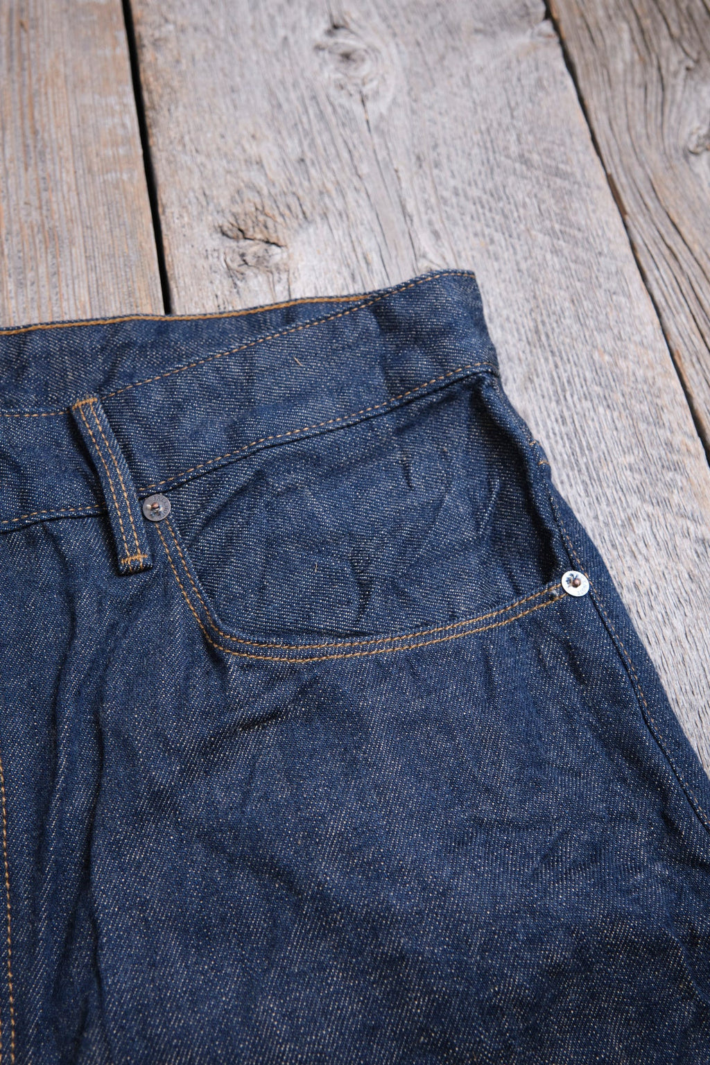Freenote Belford Straight 13 oz rinsed denim jeans, showcasing the classic fit and deep indigo color with visible stitching details.