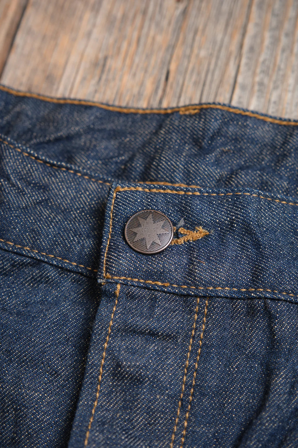 Freenote Belford Straight 13 oz rinsed denim jeans, showing classic fit and deep blue wash with subtle fading and stitching details.