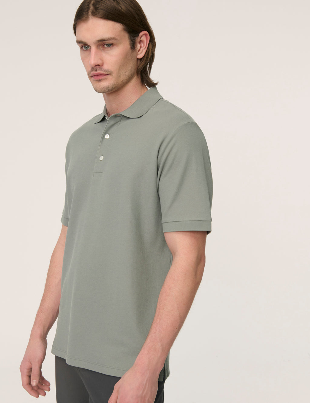 Håndværk Pique Polo in Poppy Seed color, men's casual clothing with a classic collar and button placket, on a white background.