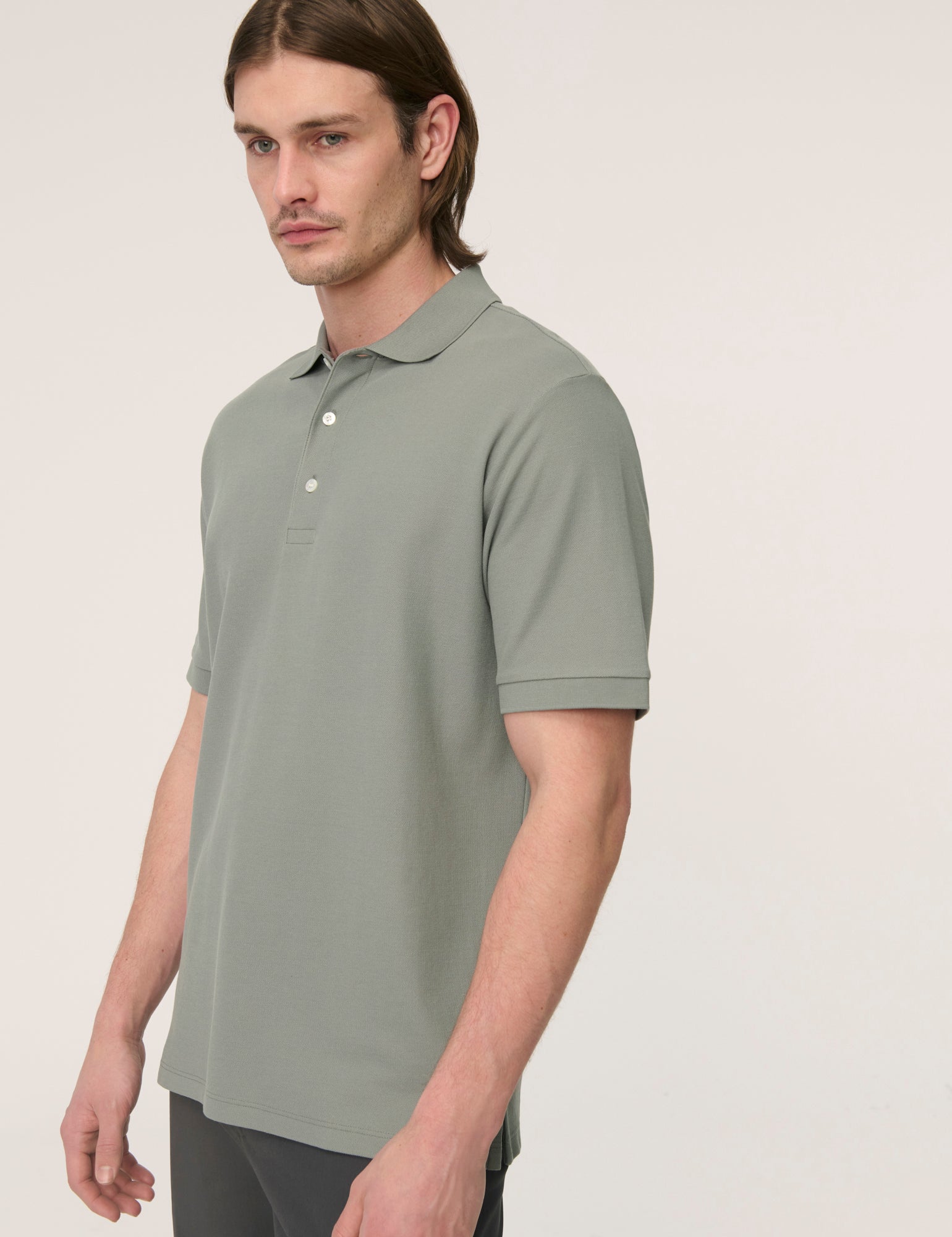 Håndværk Pique Polo in Poppy Seed color, men's casual clothing with a classic collar and button placket, on a white background.