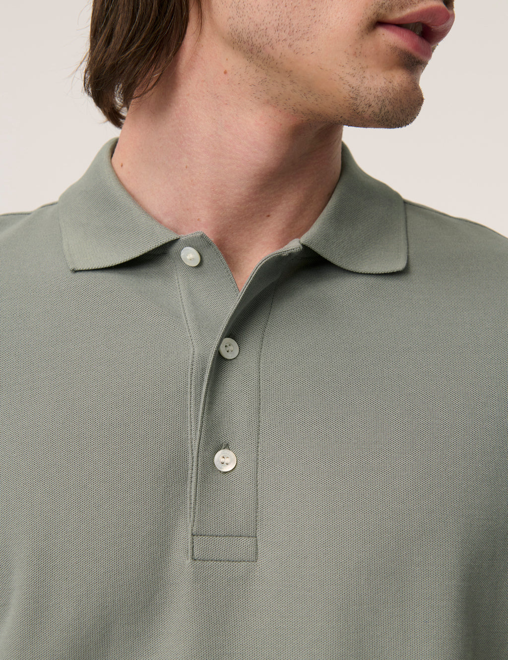 Håndværk Pique Polo in Poppy Seed color, men's casual clothing with a classic collar and short sleeves, lightweight fabric.