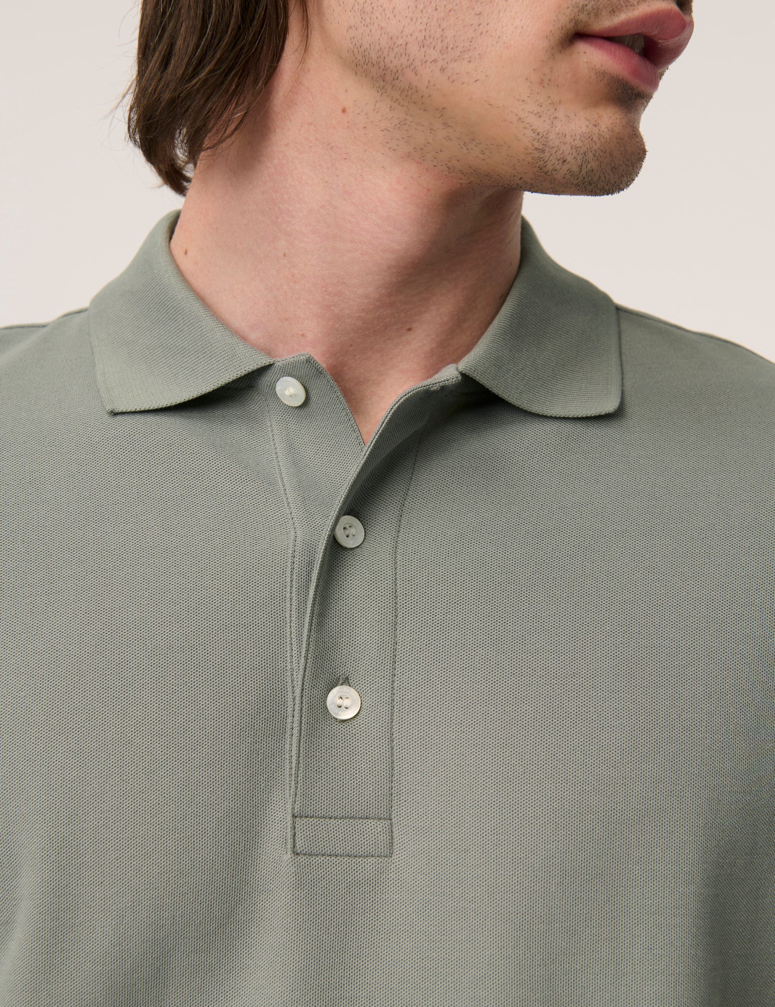 Håndværk Pique Polo in Poppy Seed color, men's casual clothing with a classic collar and short sleeves, lightweight fabric.