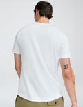 White crew neck T-shirt by håndværk, casual clothing with short sleeves and a comfortable fit, shown on a plain background.