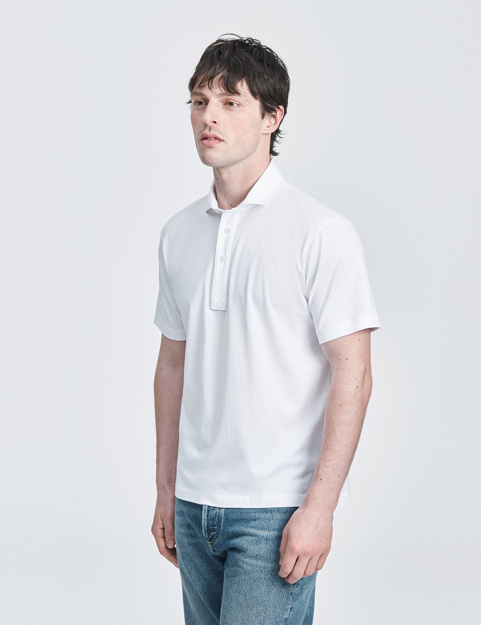 White spread collar jersey polo shirt by håndværk, featuring a classic design and comfortable fit for casual or smart-casual wear.