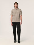 Håndværk spread collar jersey polo in stoneware color, featuring a classic collar and comfortable fabric for casual wear.
