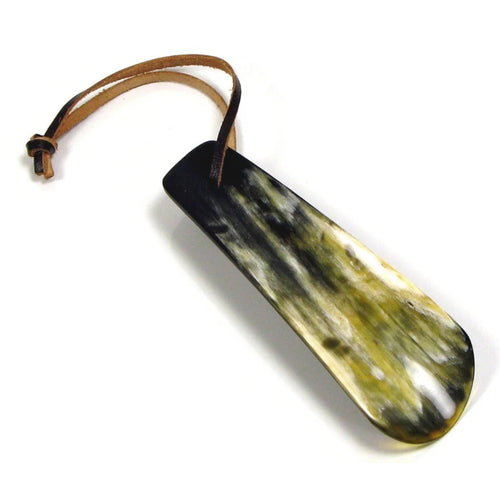 Abbeyhorn 4-inch travel shoehorn with leather thong, made from polished horn, designed for easy shoe fitting on the go.