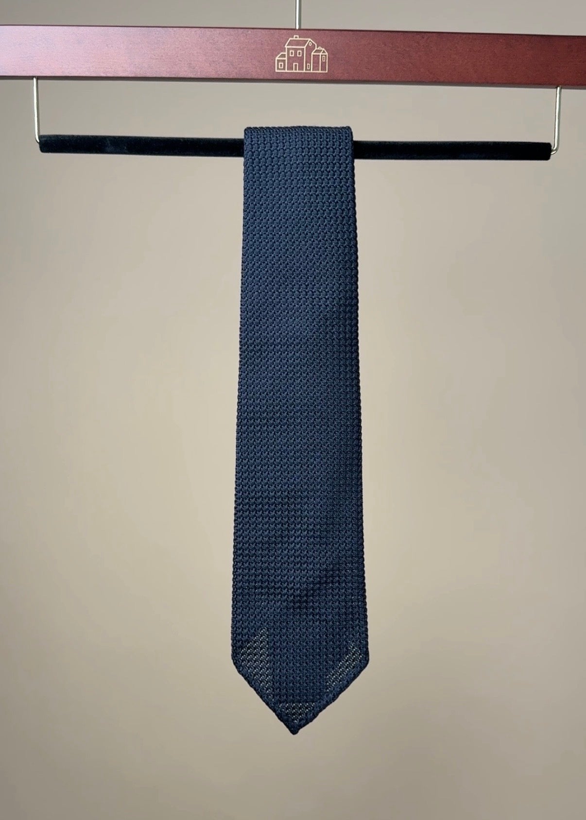 Navy Grenadine tie by Paolo Albizzati, showcasing fine textured silk fabric, ideal for formal accessories and stylish outfits.