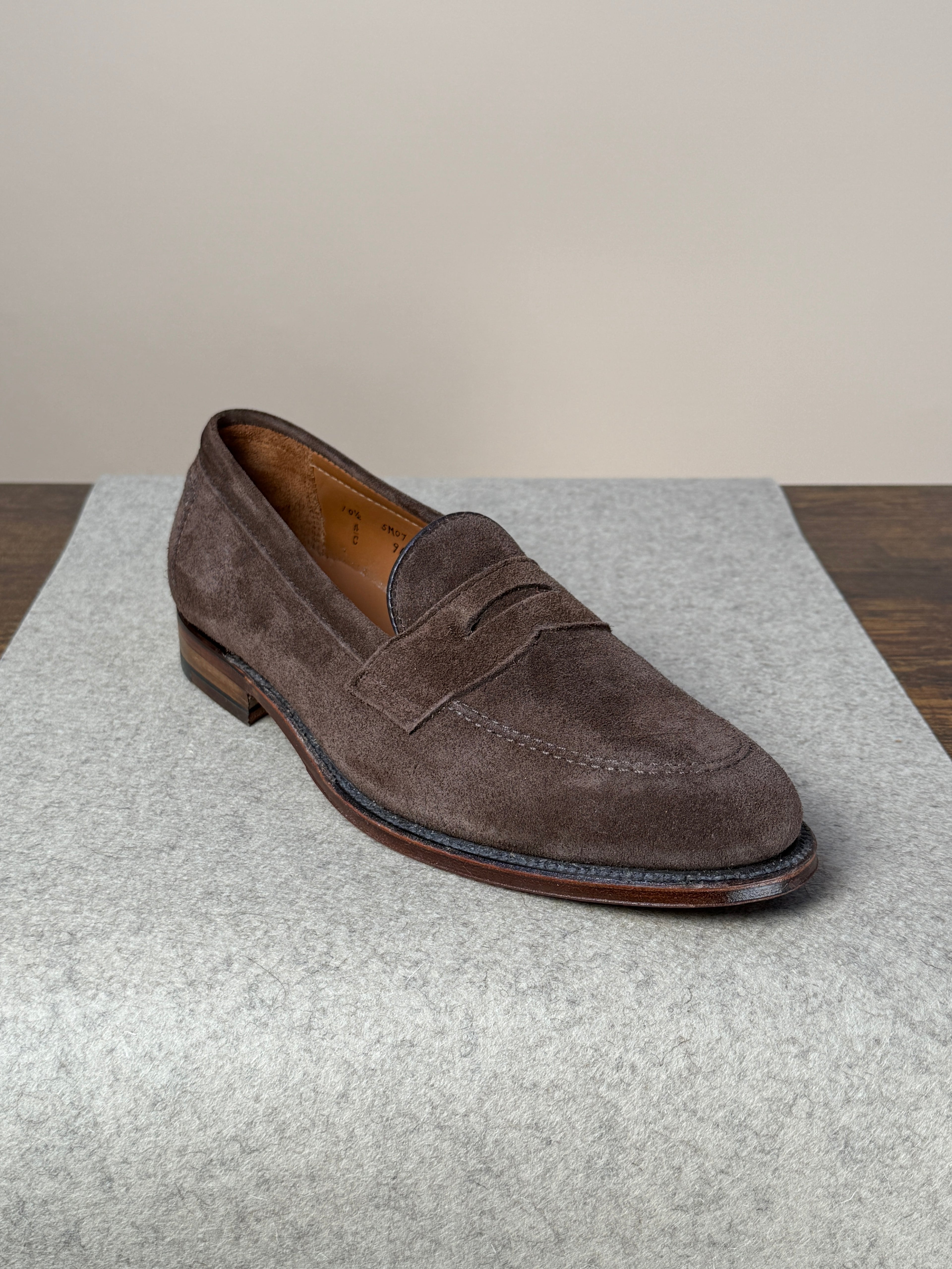 Alden Copley Penny Loafer in dark brown suede, stylish men's footwear with classic penny strap and smooth suede finish.