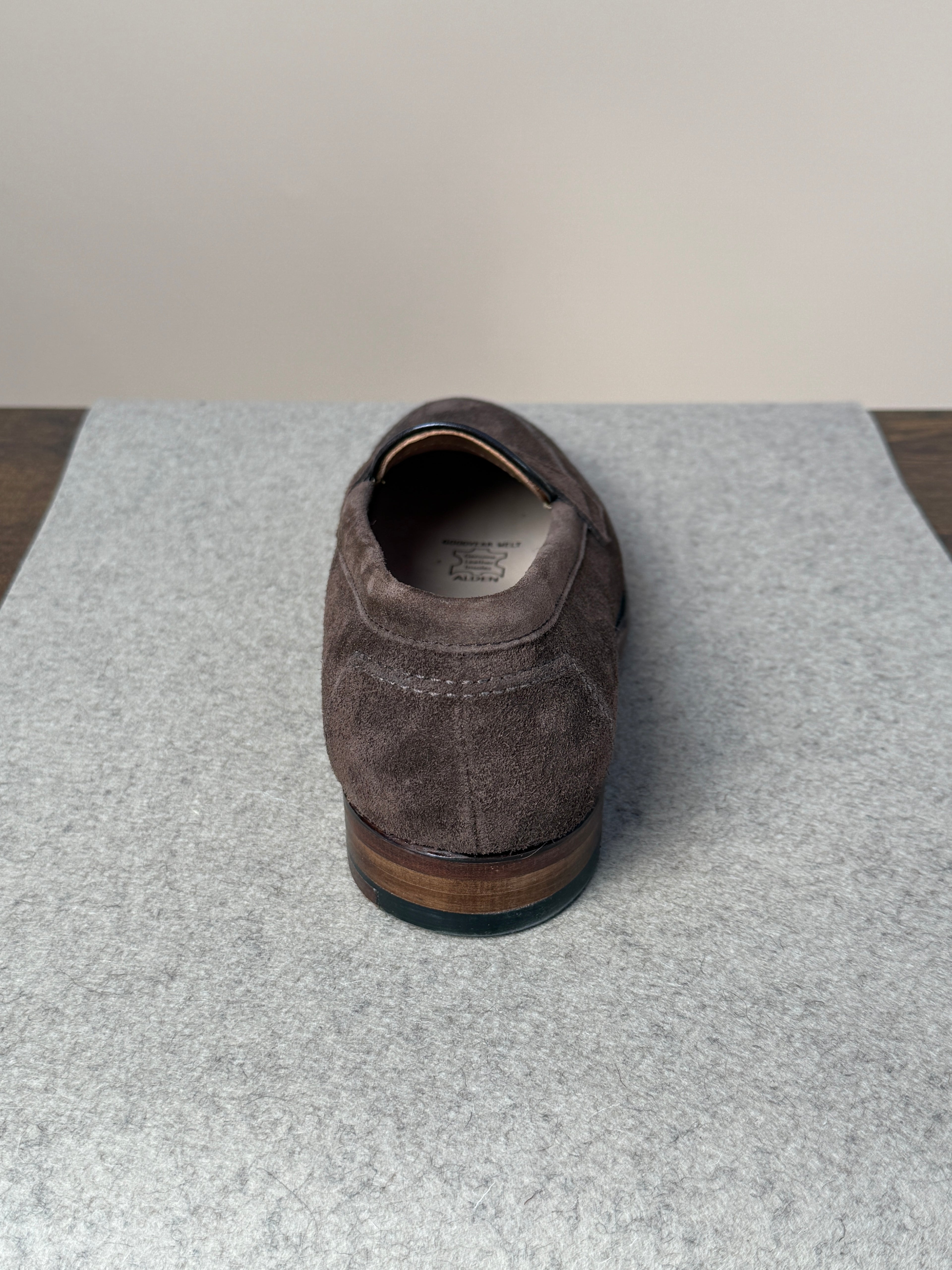 Alden Copley Penny Loafer in dark brown suede, men's footwear, showcasing classic slip-on design with detailed stitching and smooth suede finish.