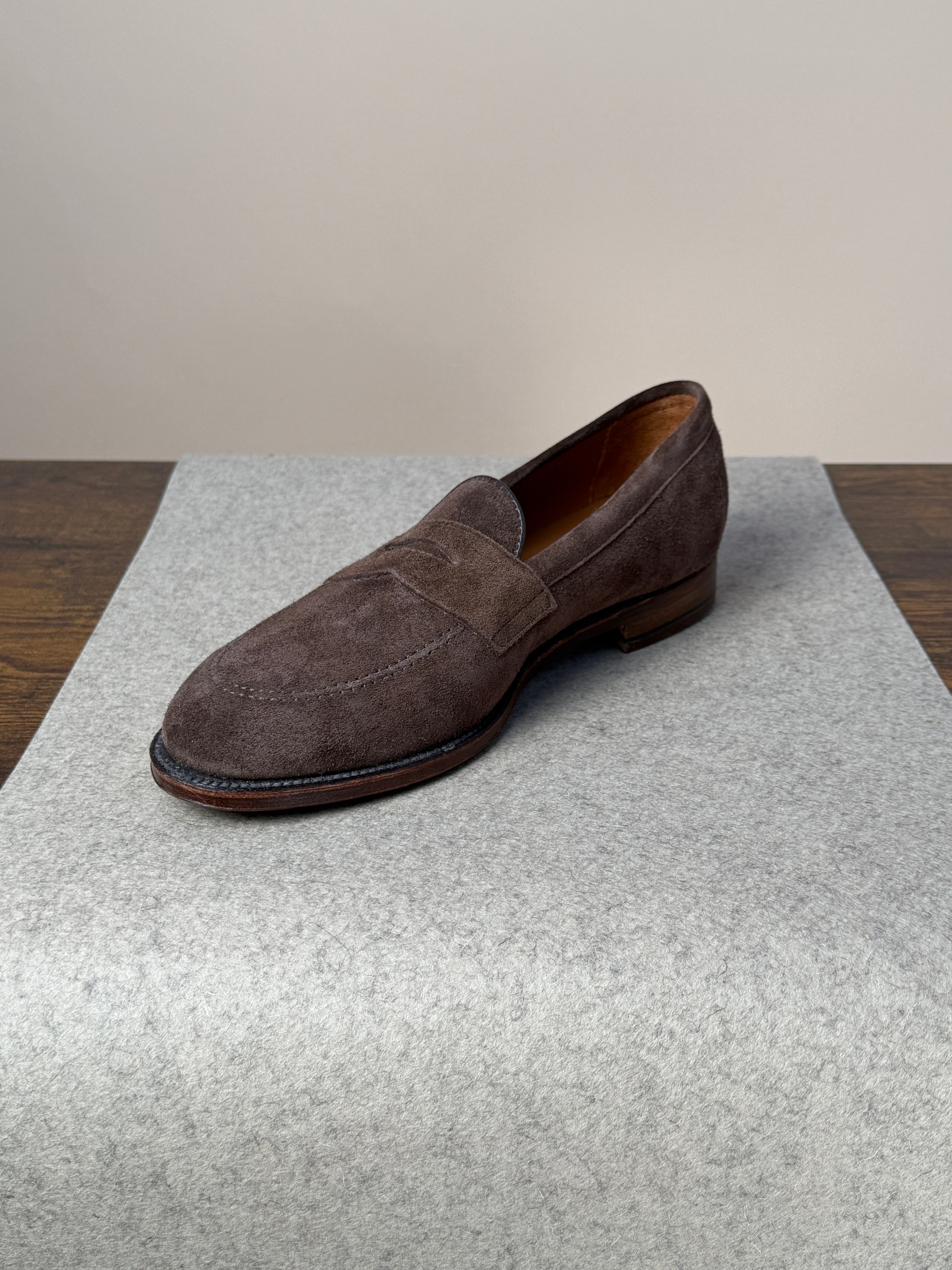 Alden Copley Penny Loafer in dark brown suede, stylish men's footwear with classic penny strap and sleek design.