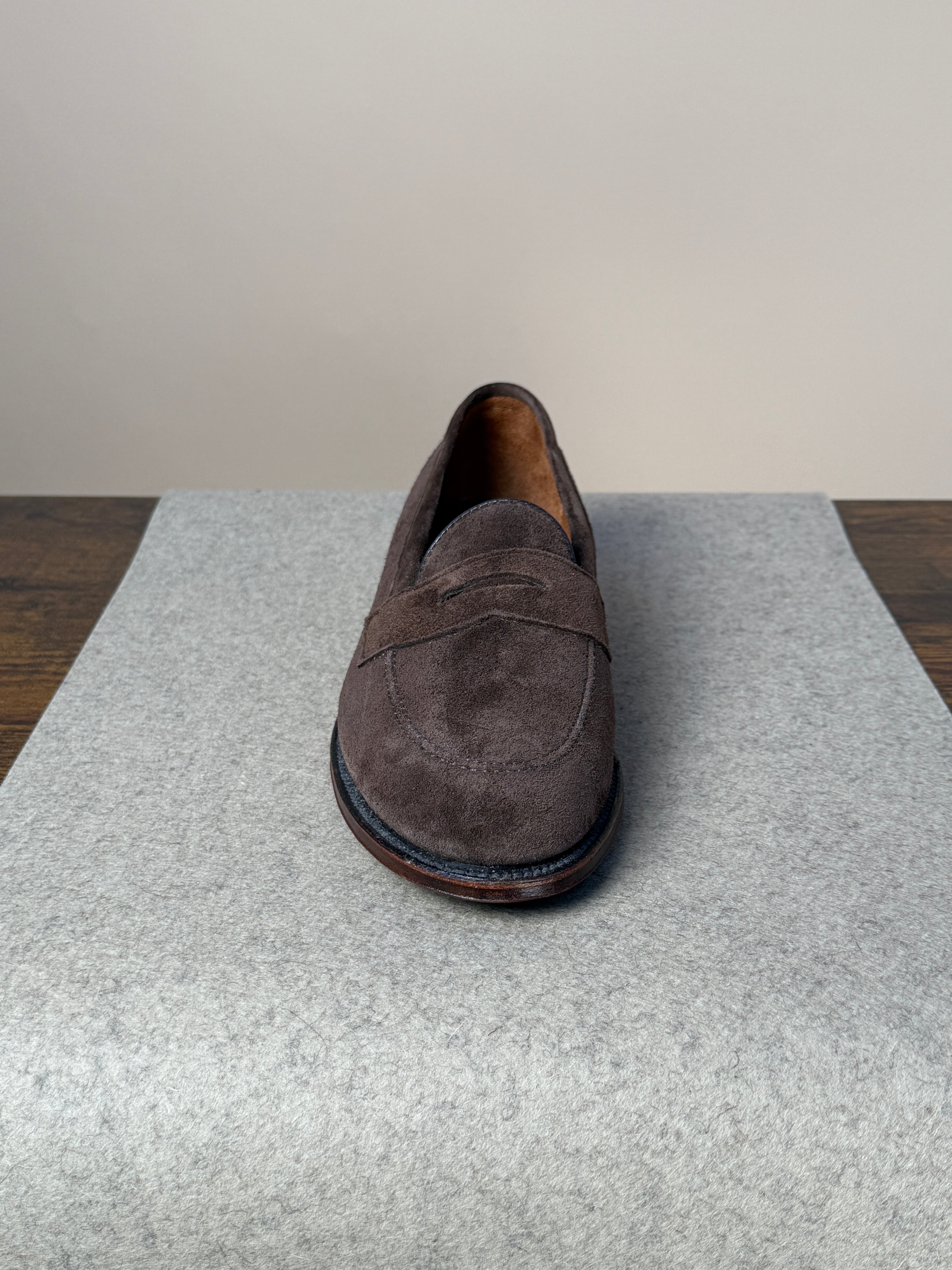 Alden Copley Penny Loafer in dark brown suede, showcasing classic slip-on footwear with a sleek design and penny strap detail.