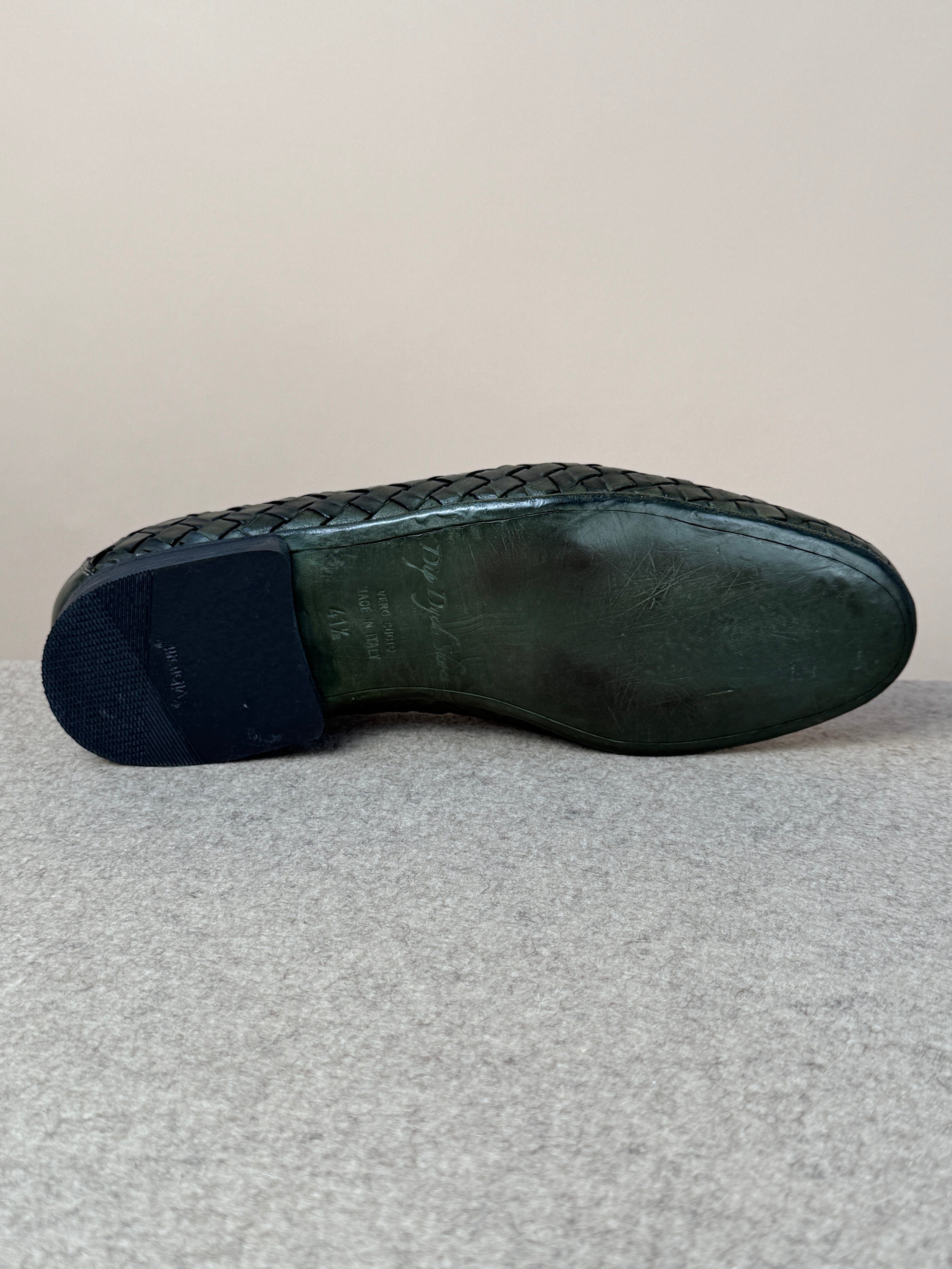 Green Dolcevita woven loafer by Mario Bemer, showcasing stylish woven leather details and classic slip-on footwear design.