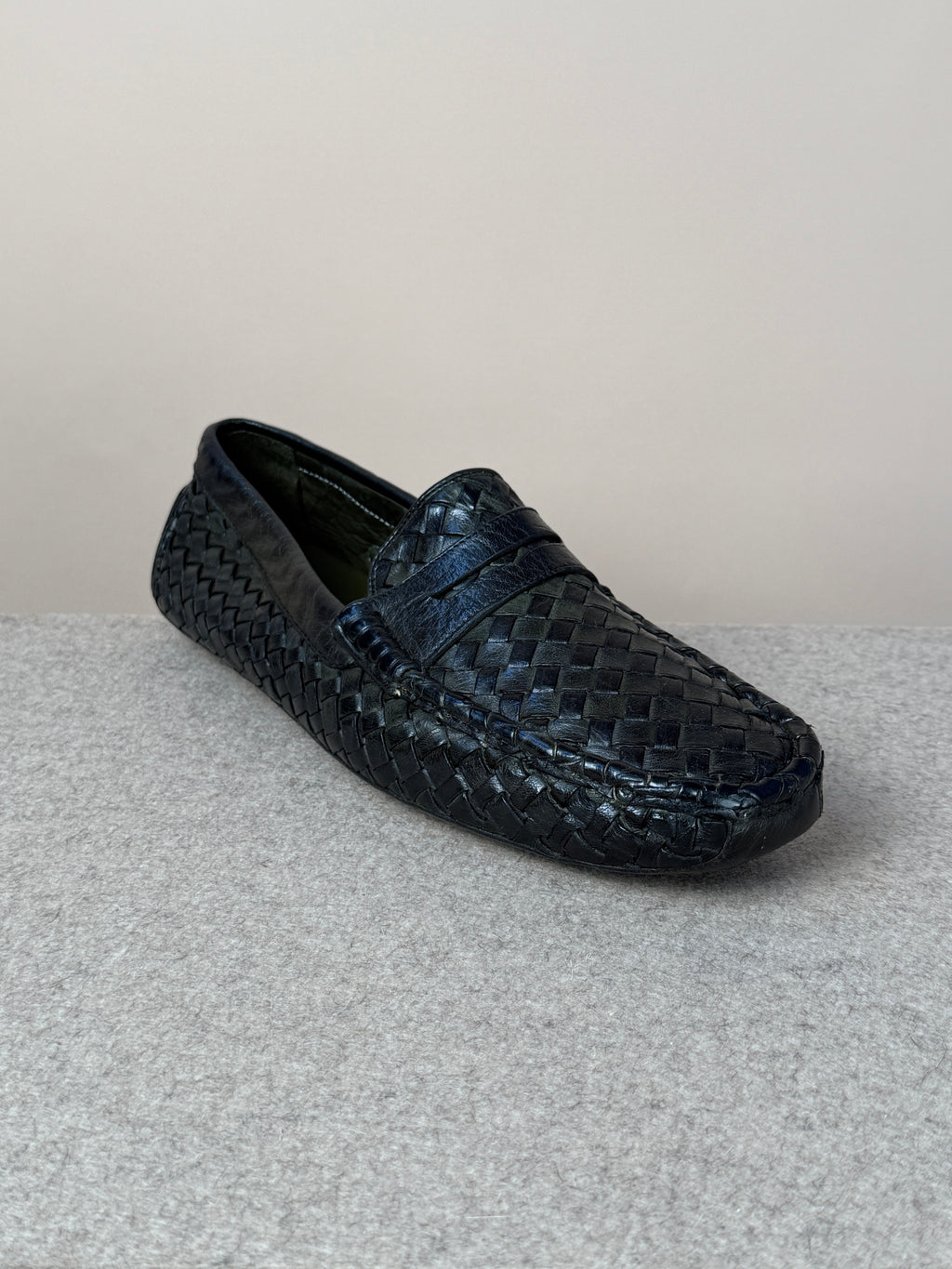 Green woven driving loafer by Mario Bemer, stylish footwear with intricate woven design and comfortable slip-on style.