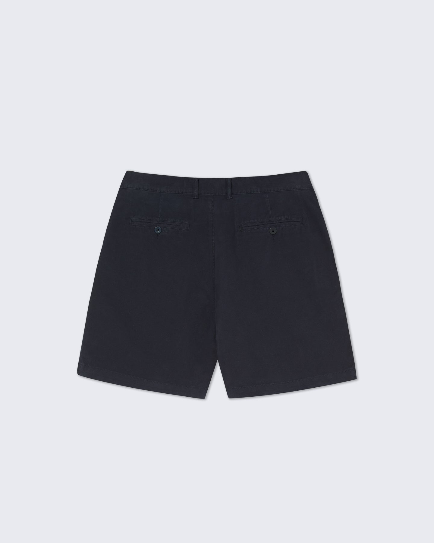 Dark navy Lapa Canvas Pleated Shorts by La Paz laid flat, showing their pleats and casual style.