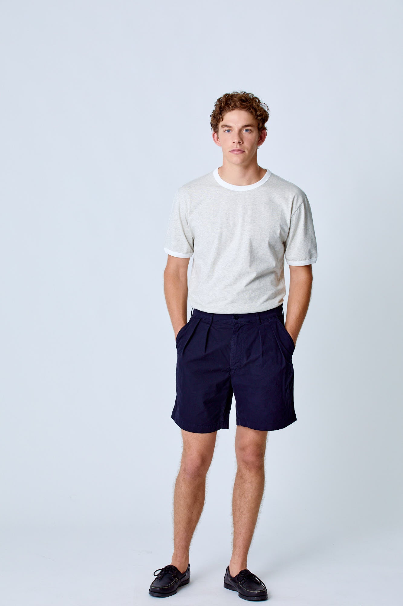 Dark navy Lapa Canvas Pleated Shorts by La Paz, shown in a casual clothing style with pleats and a relaxed fit.