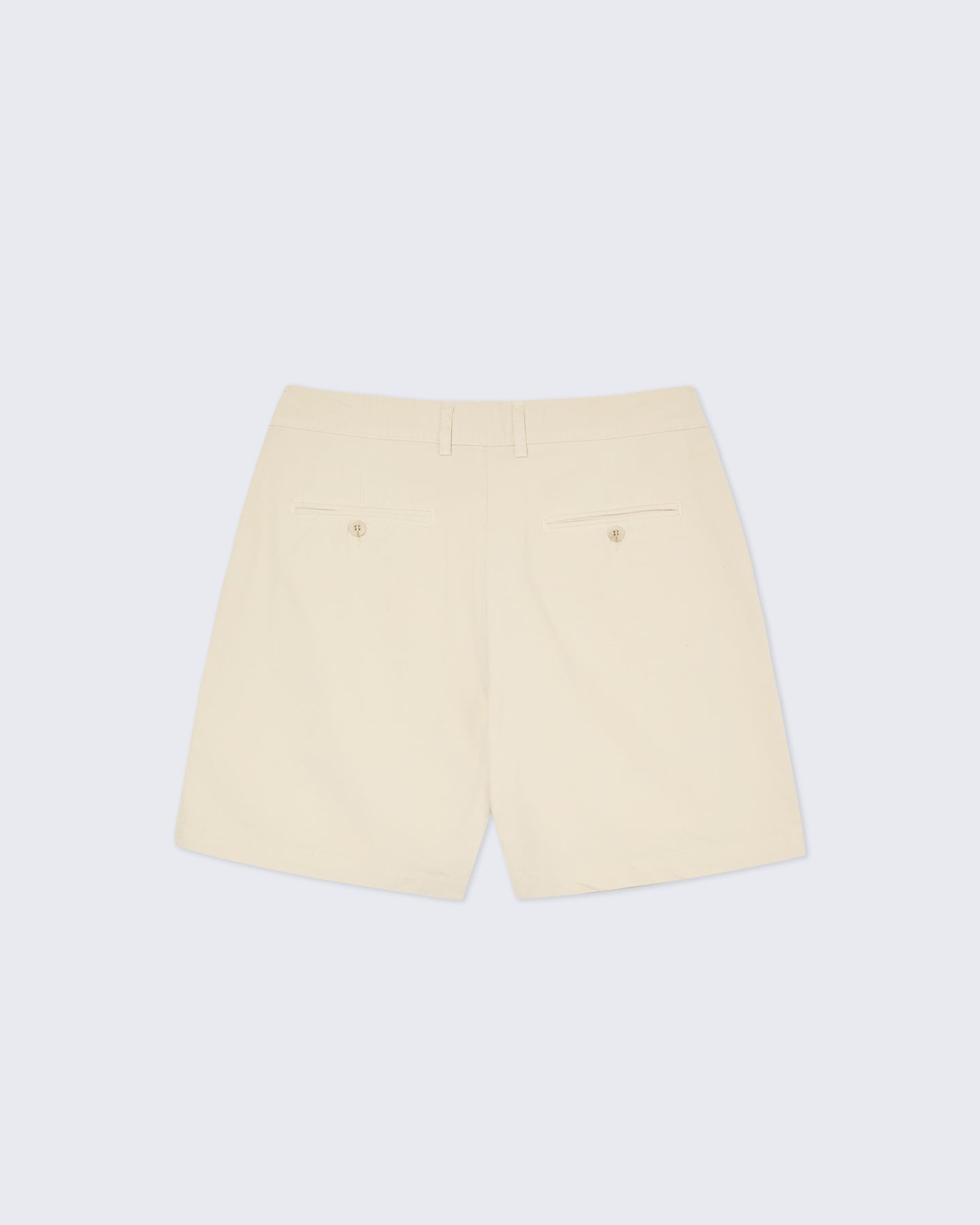 Cream Lapa Canvas Pleated Shorts by La Paz, featuring a relaxed fit and pleated design, shown on a model.
