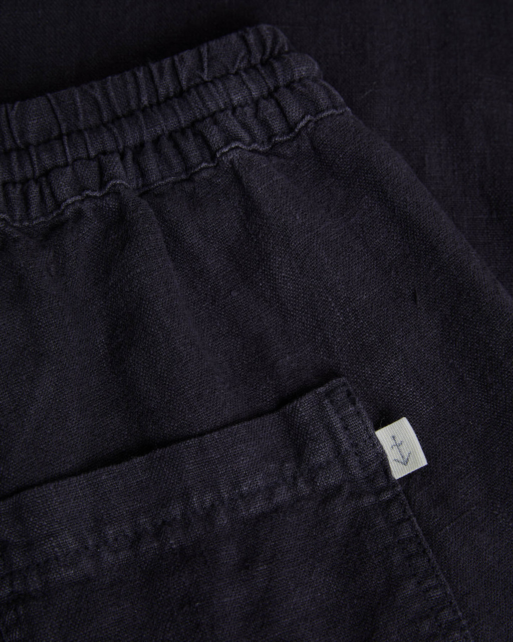 Dark navy La Paz ponte linen lounge pants displayed on a model, showcasing relaxed fit and comfortable casual style.
