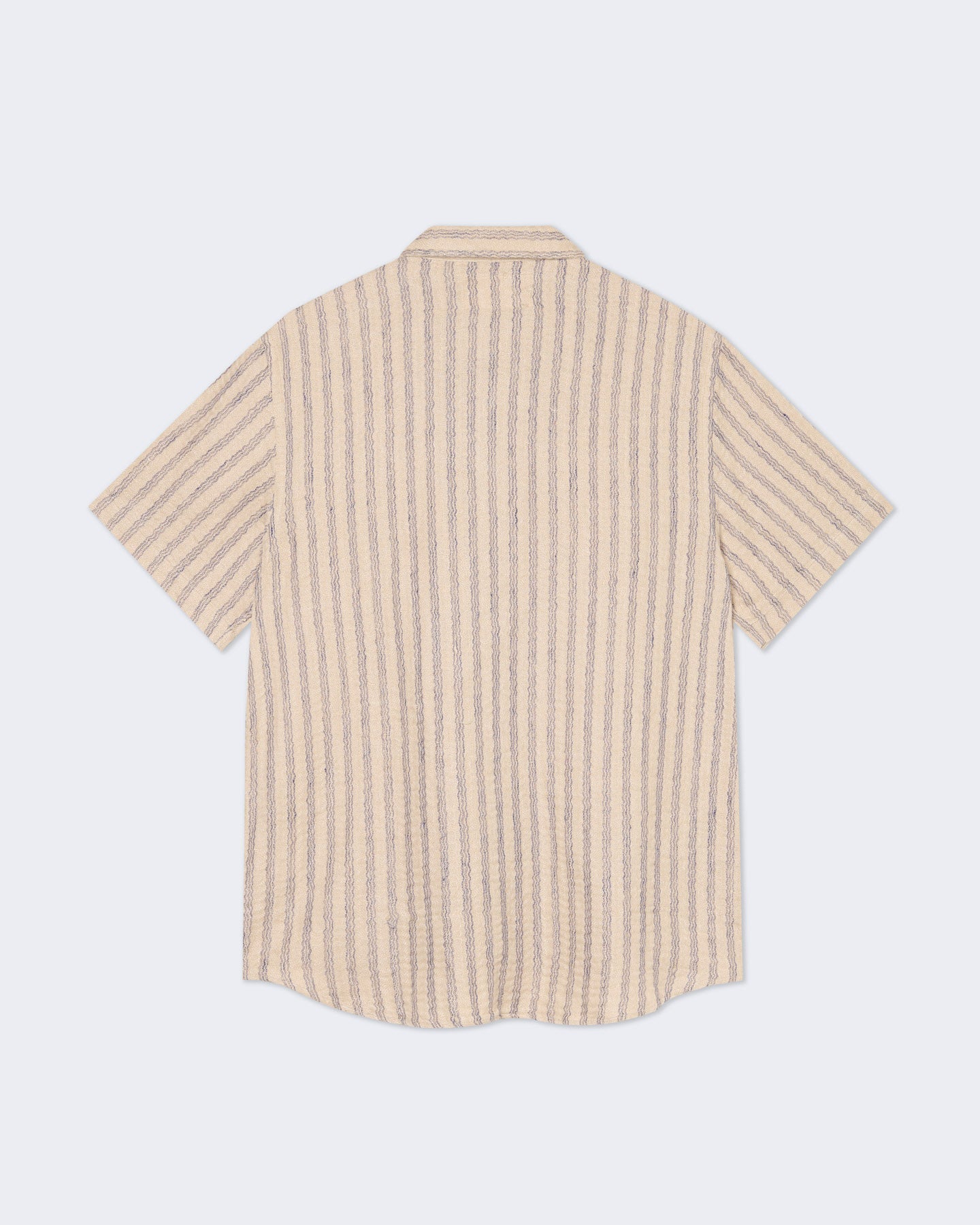Blue striped Silveira shirt by La Paz, shown on a hanger with a classic collar and button-up front.
