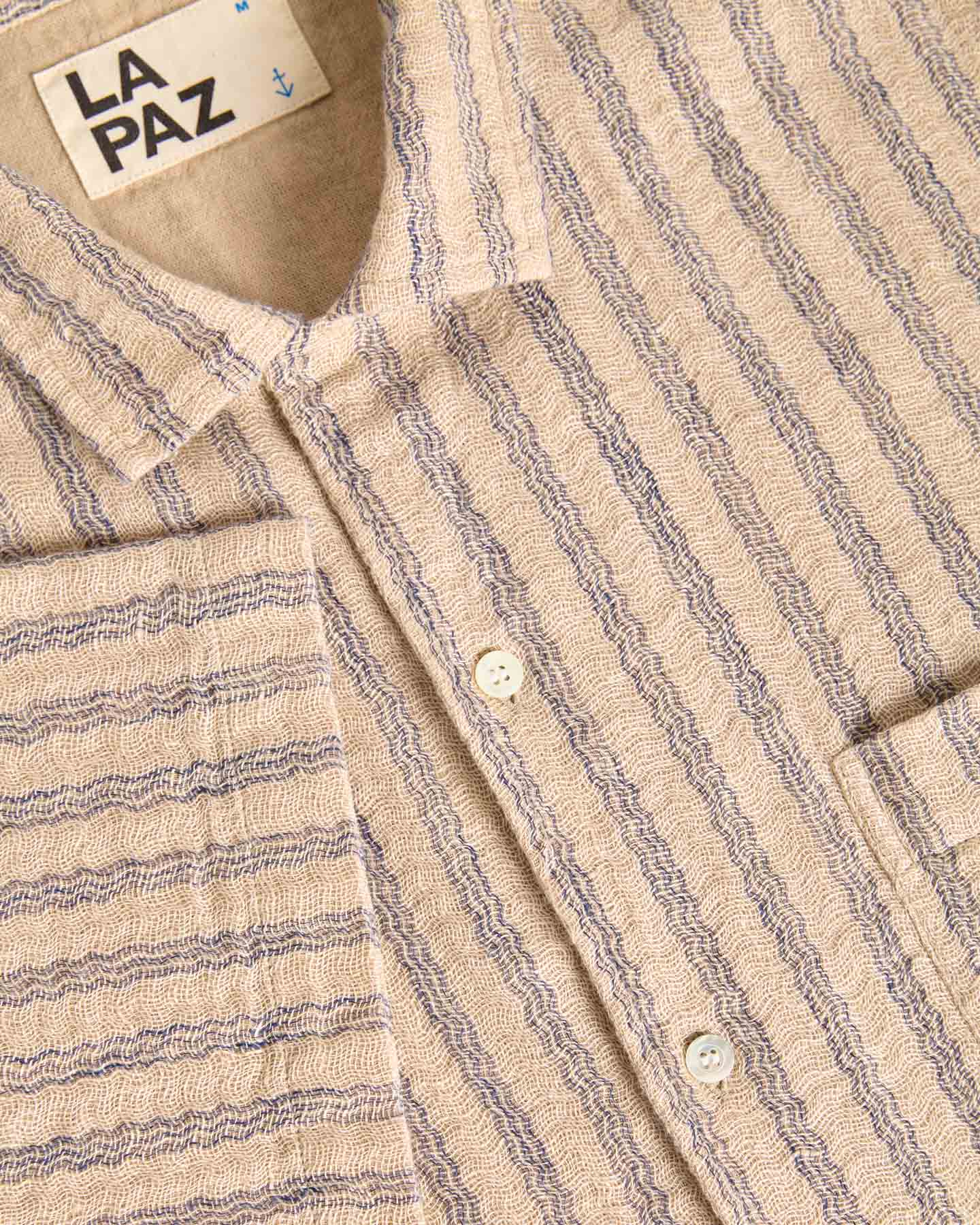 Blue striped Silveira shirt by La Paz, casual men's clothing with a classic button-up design and collar.