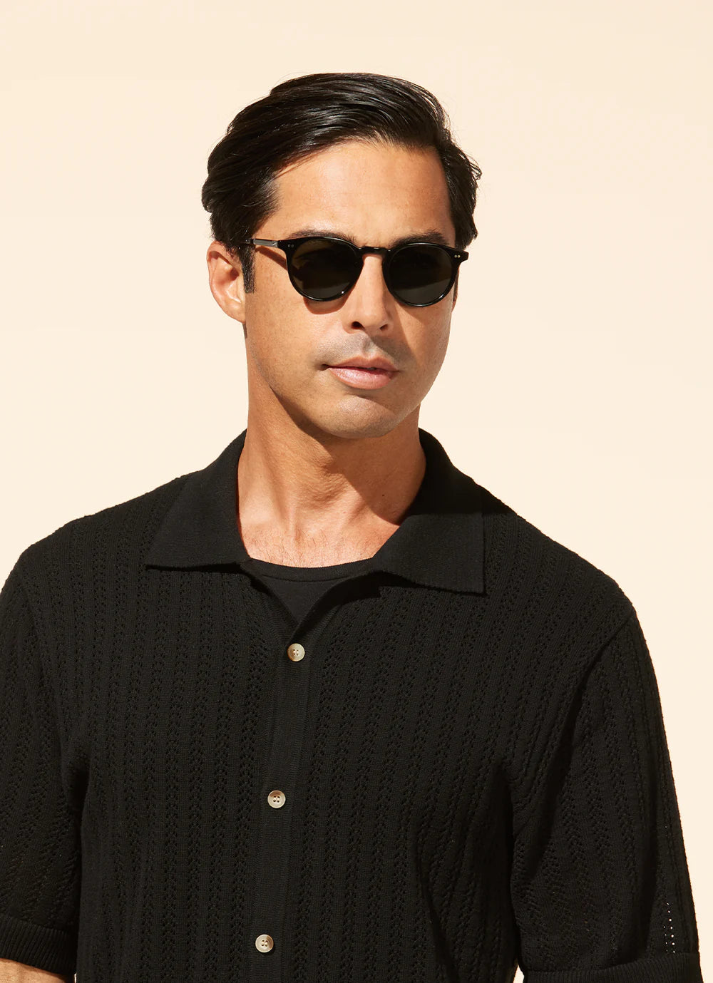 Garrett Leight Luckman S sunglasses with black pewter frames and blue smoke lenses, stylish accessories for sunny days.