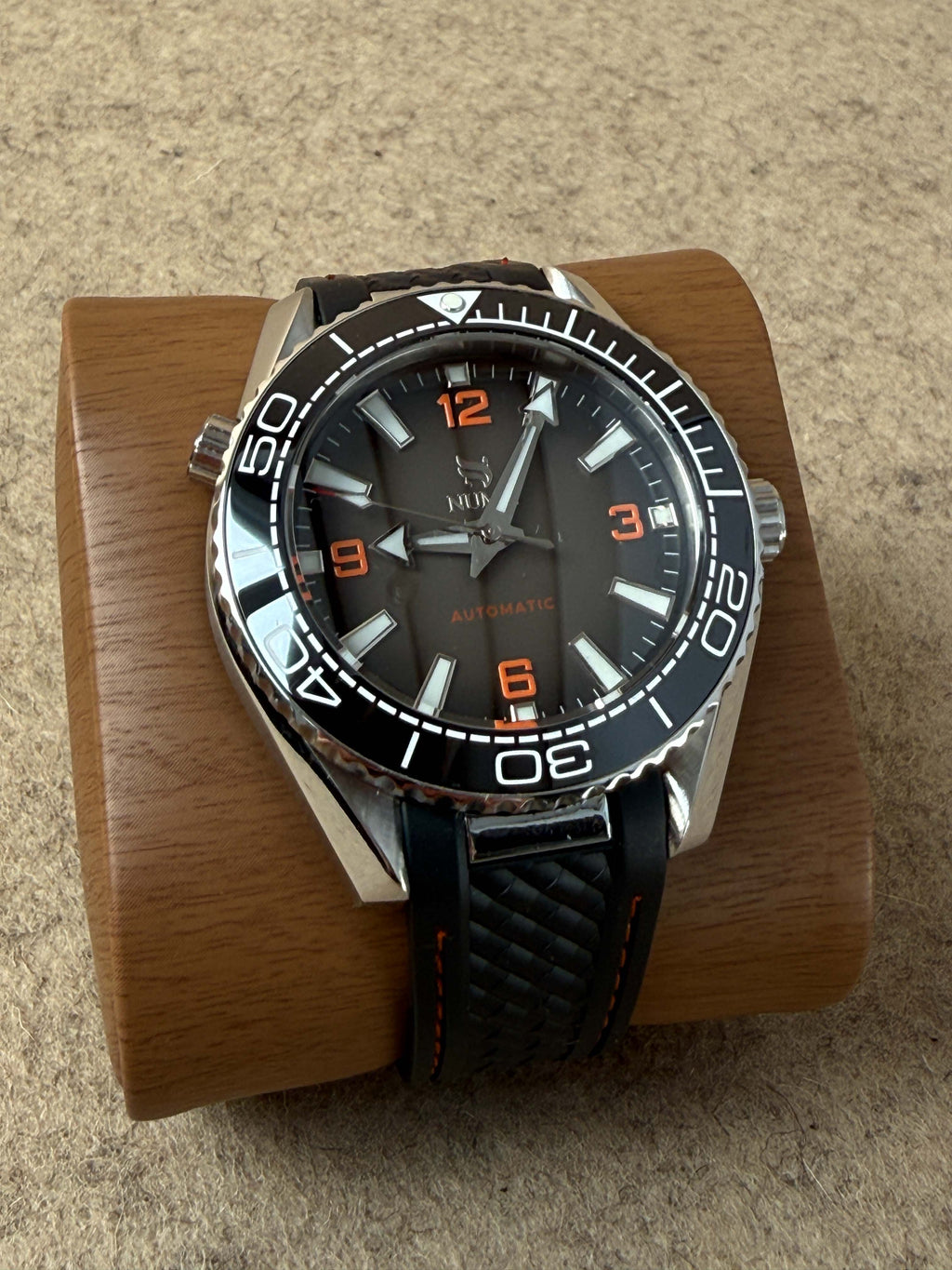 Close-up of a NUMA Watchman watch, showcasing its detailed accessories and sleek design.